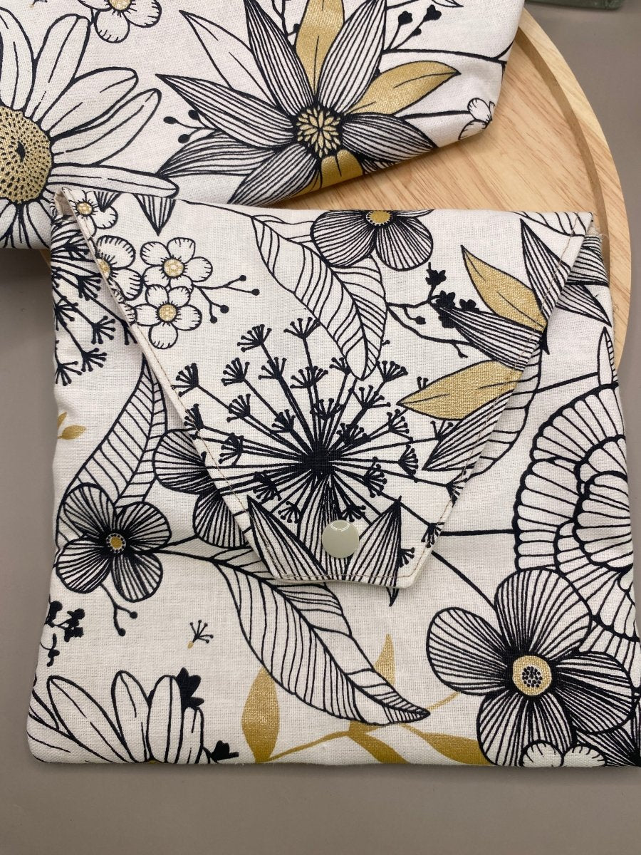 Poche intérieure amovible en coton upcyclé, 18x20 cm, fixation par scratch.